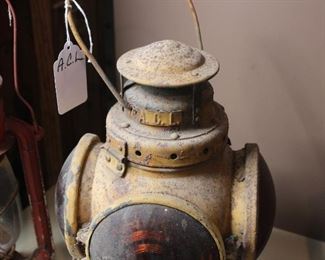 ONE RAILROAD CABOOSE LANTERN ( LAST PATTENED IN 1915.  MADE BY ARMSPEAR WITH RED AND AMBER LENSES WITH MOUNTING BRACKET) MARKED A.C.L.