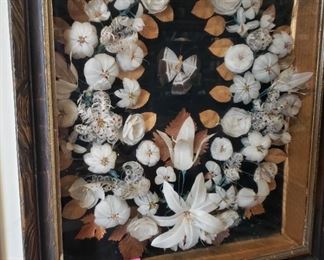 Antique framed feather, butterfly motif. 