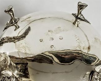 Sterling silver richly decorated tea set from England.