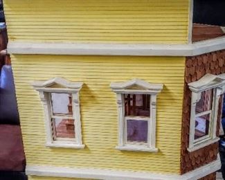 Large handmade wooden dollhouse with furniture & accessories.