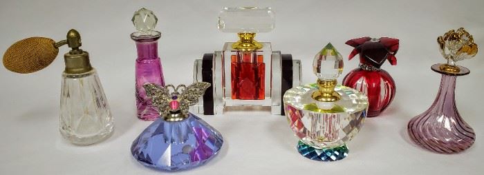 Perfume bottle collection by various makers.