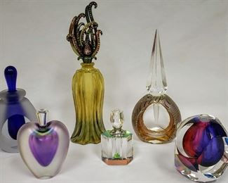 Perfume bottle collection by various makers.
