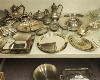 Tons of silver plate & pewter service pieces.