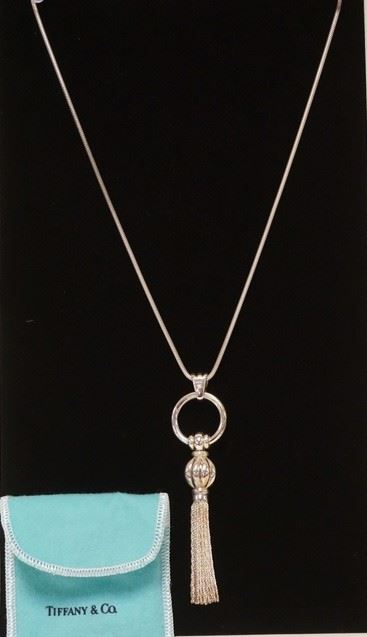 1001	TIFFANY & COMPANY STERLING SILVER NECKLACE W/ TASSEL PENDANT. BOTH THE NECKLACE & PENDANT ARE SIGNED TIFFANY. TOTAL WEIGHT 1.572 TROY OUNCES 

