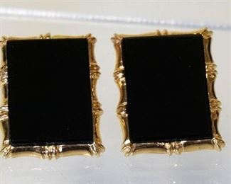 1007	PAIR OF 14K YELLOW GOLD CLIP ON EARRINGS W/ GENUINE BLACK ONYX. TOTAL WEIGHT INCLUDING STONES 6.50 DWT
