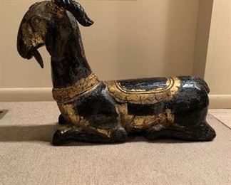 Painted wooden figure of a goat 