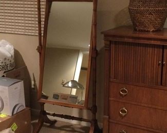 Faux bamboo cheval mirror and Baker tall chest with tambour door