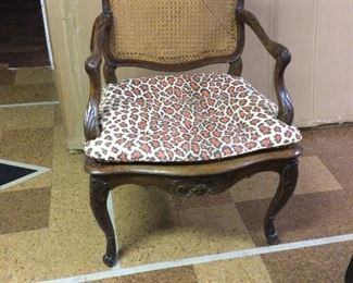 French arm chair with cane seat and back