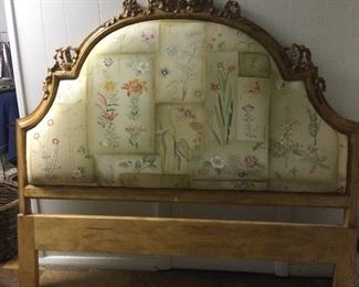 Carved upholstered headboard in Clarence House fabric