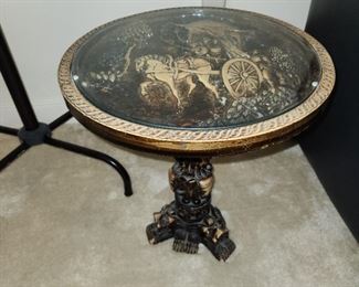 carved table with glass top