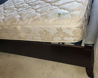 side of bed (1 slight nic)