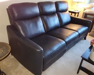 82 inch Navy blue leather-like electric reclining (push button) sofa. Both ends recline and headrests can be adjusted. Both ends also have built in USB ports. Sofa is one year old, purchased from Bob's in Hunt Valley