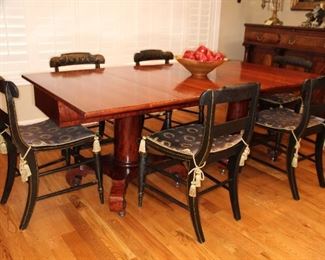 Presell @ $7498 (table only)
American Empire Mahogany Banquet Table with two pedestal bases ending in scroll feet. Joined together by original brass hinges. Can be separated and top turned to make matching card tables. Attributed to New York. Circa 1830
Dimensions: 29”H x 80”W x 40”D
Stock #025
