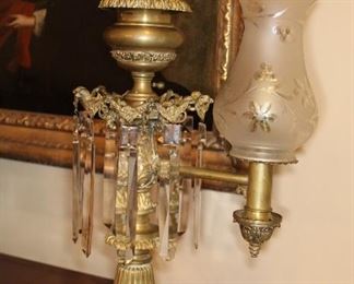 Presell @ Pair $7998
Pair of bronzed Armand lamps single branch with frosted shades of the period, foliate swags around the top supported by eagles, large prisms, and paw feet. Circa 1830
Dimensions: 23”H x 14”W
Stock #009 (1 of 2)