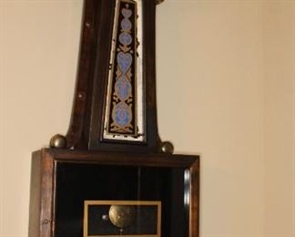 Presell @ $798
Banjo Clock by Ingraham in decorative walnut case. Blue and gold designed eglomise is middle section and black eglomise in lower section. Topped with eagle finial. Circa late 19th century
Dimensions: 36”H
Stock #041