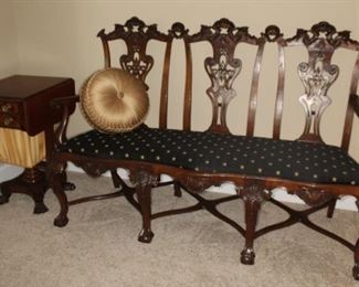 Presell @ $7998
Mahogany Chippendale Bench - 3 chair back, shell cartouche crest, shaped seat, four carved legs with ball and paw feet, carved knees with three trestle stiles. Circa 1790
Dimensions: 44”H x 65”W x 20”D
Stock #032