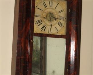 Presell @ $998
Antique Mahogany Ogee Case Wall Clock – with replaced mirror in lower section of door. Circa 1800’s  
Stock #055