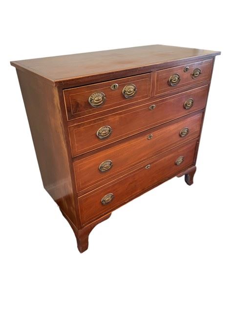 $600.00 USD    Antique 5 Drawer Bachelor Chest Dresser Inlaid & Banded CD131-59
Description: Mahogany rectangular top with banded veneer edge, light wood line inlay highlights, two over three graduated flush drawers, inlaid escutcheon, shaped bracket foot base.
Condition: Excellent condition
Dimensions: 40 x 19 x 37.5"H
Local pick up Leesburg, VA.  Contact us for shipper suggestions.       https://goodbyhello.com/products/5-drawer-chest-dresser-w-inlay-cd131-59?_pos=7&_sid=81d502833&_ss=r