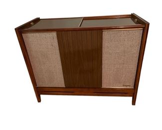 $250.00 USD     Mid Century Magnovox Stereo Phonograph Cabinet MK144-21     Description:  Mid century stereo console cabinet. This beautiful piece features a walnut cabinet with sliding tambor door which stores the radio component along with turntable.
Condition: good condition.
Dimensions: 38 x 17 x 30"H
Local pick up only McLean VA after 1/1/23.  Contact us for shipper suggestions.     https://goodbyhello.com/products/mid-century-magnovox-stereo-phonograph-cabinet-mk144-21?_pos=1&_sid=78f29209e&_ss=r