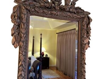 $1000 - Ornate Carved Large Mirror MK144-25                          Description: Outstanding quality carved walnut rectangular wall mirror with an outstanding beautiful quality carved walnut frame with a wreath above carved acanthus leaves. The exceptional quality of the craftsmanship and design are evident throughout this special piece.
Condition: Very good 
Dimensions: 23.5 x 32"H The mirror measures 19.75" tall and 15" wide.
Local pick up McLean VA.  Contact us for shipper suggestions.  https://goodbyhello.com/products/ornate-carved-large-mirror-mk144-25?_pos=4&_sid=f7a8ac413&_ss=r
