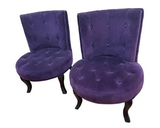 $160     Pair of Low Seat Purple Tufted Upholstered Chairs DG145-14      Description:  Add a pop of color with these side chairs. Founded atop briarwood legs, the velvet upholstered chair is functional and decorative. These small accent chairs features a lovely fabric and tufted on both seat and back, perfect for any design aesthetic. These chairs can be placed in any room or office space.
Condition: Very good
Dimensions: 24 x 24 x 31"H  Seat=15"
Local pick up Rockville, MD.  Located in basement level.  Contact us for shipper suggestions.     https://goodbyhello.com/products/pair-of-small-purple-tufted-upholstered-chairs-dg145-14?_pos=7&_sid=393e46d62&_ss=r