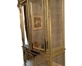 $24000     French Country Gold & Mirror Armoire DG145-7     Description:   This classic silhouette is transformed into a glamourous focal point with its mirrored surface, glimmering silver leaf trim and Visage finish, a patina of silver greige with amber glaze. Shelves or open for a TV behind two upper doors, and two bottom doors.
Condition: Very good
Dimensions: 49 x 26 x 87"H
Local pick up Rockville, MD.  Located on the second floor.  Contact us for shipper suggestions.    https://goodbyhello.com/products/gold-mirror-armoire-dg145-7?_pos=3&_sid=393e46d62&_ss=r