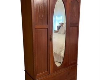 $1400    Antique Mahogany English Linen Press Mirrored Armoire w Ribbon Inlay DG145-8      Description:   Beautiful early Mahogany Linen Press/Armoire with inlay panels, large oval mirror, single bottom drawer, and working door lock. Original, unaltered finish. Interior has brass hooks and bar. The piece comes apart in 3 sections allowing easy movement.
Condition: Very good.  Missing one pull but we have it
Dimensions: 42 x 16 x 78"H
Local pick up Rockville, MD.  Located on the second floor.  Contact us for shipper suggestions.     https://goodbyhello.com/products/antique-mirrored-armoire-dg145-8?_pos=9&_sid=393e46d62&_ss=r