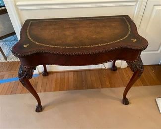 Description: This table is AMAZING!  When closed, it is a beautiful leather top demi lune table but when opened, it is a gorgeous 8 person dining table.  Just a gem!
Condition: Very good for age.  Leather top is in good condition also.
Dimensions: 40 x 22 x 30"H (closed)   82 x 22 x 30"H (fully opened w 3 leafs)
Local pick up Rockville MD.  Located on first floor.  Please contact us for shipper suggestions.