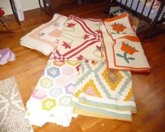 Lots of quilts  ALL are hand stitched 