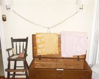 cedar chest  / blankets  / high chair 