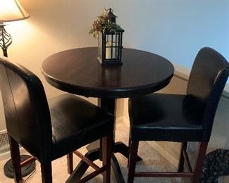 pub table with 2 chairs