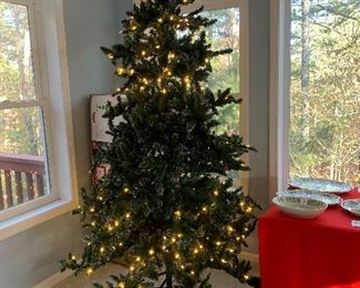 7.5 ft prelit tree.  First time out of the box.  The middle section does light up but for some reason the photos I took makes it look like they’re not on 😮