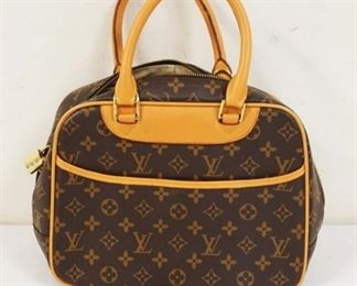 1038	LOUIS VUITTON MARKED BAG, INTERIOR DIRTY, SOME MINOR WEAR. UNKOWN IF AUTHENTIC. APPROXIMATELY 11 IN L X 8 1/2 IN H X 4 1/2 IN, ZIPPER BROKEN
