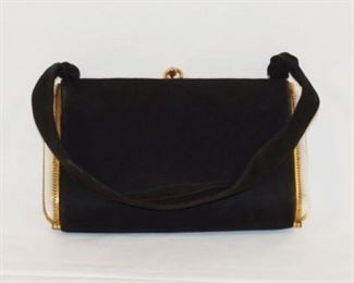1056	BEAUTIFUL SPRITZER A FUHRMANN CURACO HARD CASED FELT EVENING BAG WITH MOTHER OF PERAL ACCENTS. APPROXIMATELY 7 1/2 IN L X 4 3/4 IN H X 1 1/2 IN
