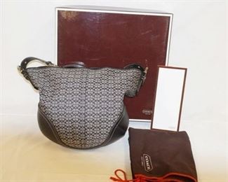 1055	VINTGE COACH SIGNATURE BUCKET BAG WITH DUST COVER, BOX AND PAPERWORK. APPROXIMATELY 14 IN L X 13 IN H
