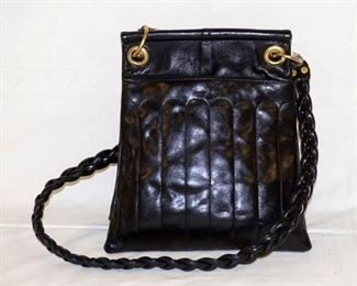 1057	CLEO & PATEK, PARIS BLACK LEATHER SHOULDER BAG WITH BRAIDED STRAP, APPROX IMATELY 11 IN L X 13 IN H

