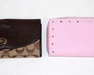 1071	2 COACH WALLETS BROWN SIGNATURE AND PINK STUDDED PATENT LEATHER
