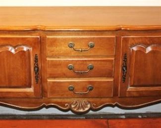 Beautiful Ethan Allen French Country style credenza is in excellent condition with more than enough storage.