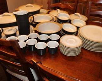 A large set of Franciscan gourmet stoneware.  This entire set looks as though it's never been used.