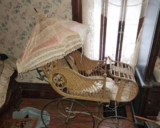 Victorian pram and parasol. Sold separately 