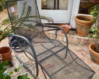 Black wrought iron chaise lounge