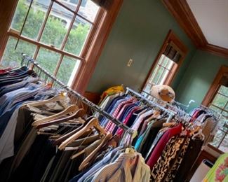 7 racks of women's clothes, both vintage and modern