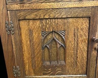 carved oak hutch cabinet detail