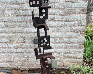 Brutalist steel yard art totem