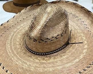palm straw sombrero and mounty-style hat