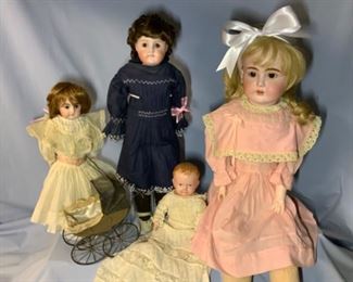 Collection of bisque headed dolls, and composition baby