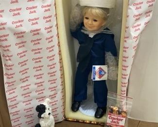 Cracker Jacks doll with his pupper