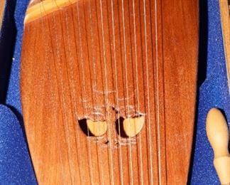 Lyre/Kantele-Psaltery Matai instrument by Tony Shatford.  It even has it's own felt lined case.  Just beautiful and never used. 