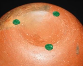 Convex base of a vintage polychrome pottery vase