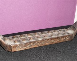 Etched & carved wood votive & candle holder with man and woman at the end of the boat.  This piece measures about 2+ ft long.